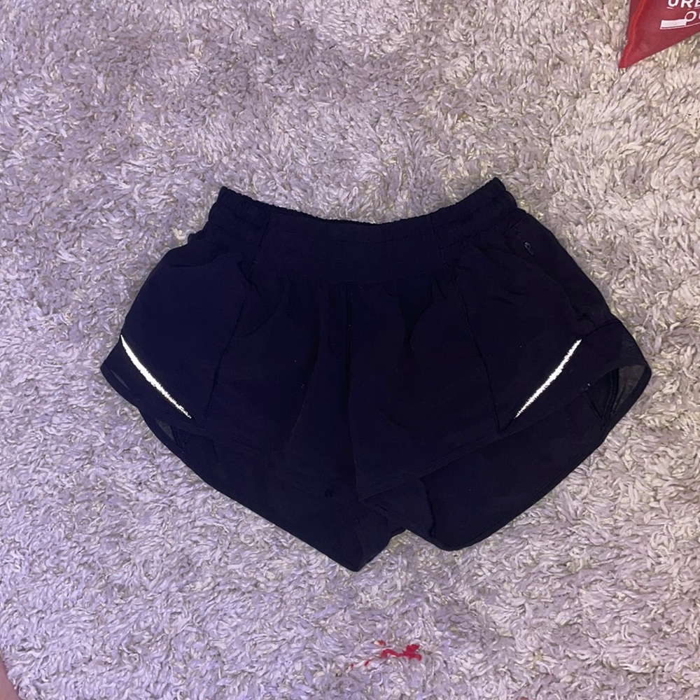 Size 4 black lululemon hotty hot shorts